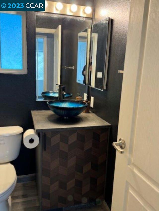 343 San Marcus Drive Vallejo, CA 94590 - Photo 16 of 20 a bathroom with a sink and a mirror