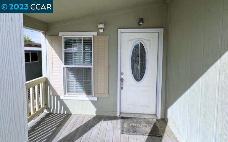 343 San Marcus Drive Vallejo, CA 94590 - Photo 2 of 20 a view of a hallway with washer and dryer