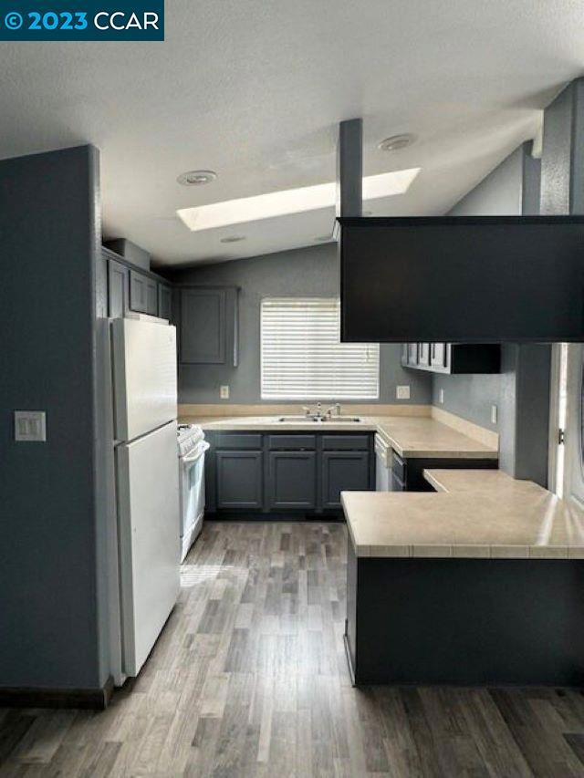 343 San Marcus Drive Vallejo, CA 94590 - Photo 6 of 20 a kitchen with a refrigerator and a sink