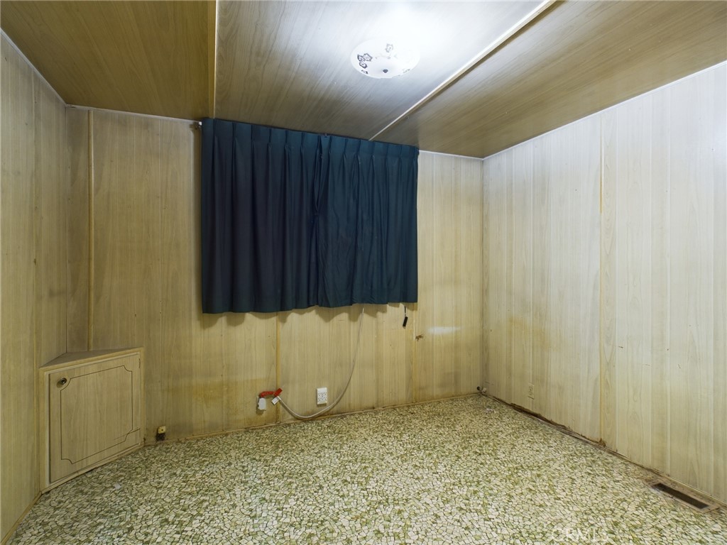 16600 Orange Avenue, Unit 55 Paramount, CA 90723 - Photo 12 of 18 a view of wooden door