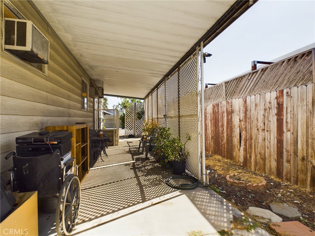 16600 Orange Avenue, Unit 55 Paramount, CA 90723 - Photo 13 of 18 a view of a porch with furniture