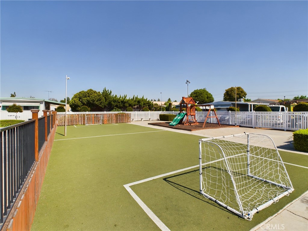 16600 Orange Avenue, Unit 55 Paramount, CA 90723 - Photo 17 of 18 a view of a tennis court