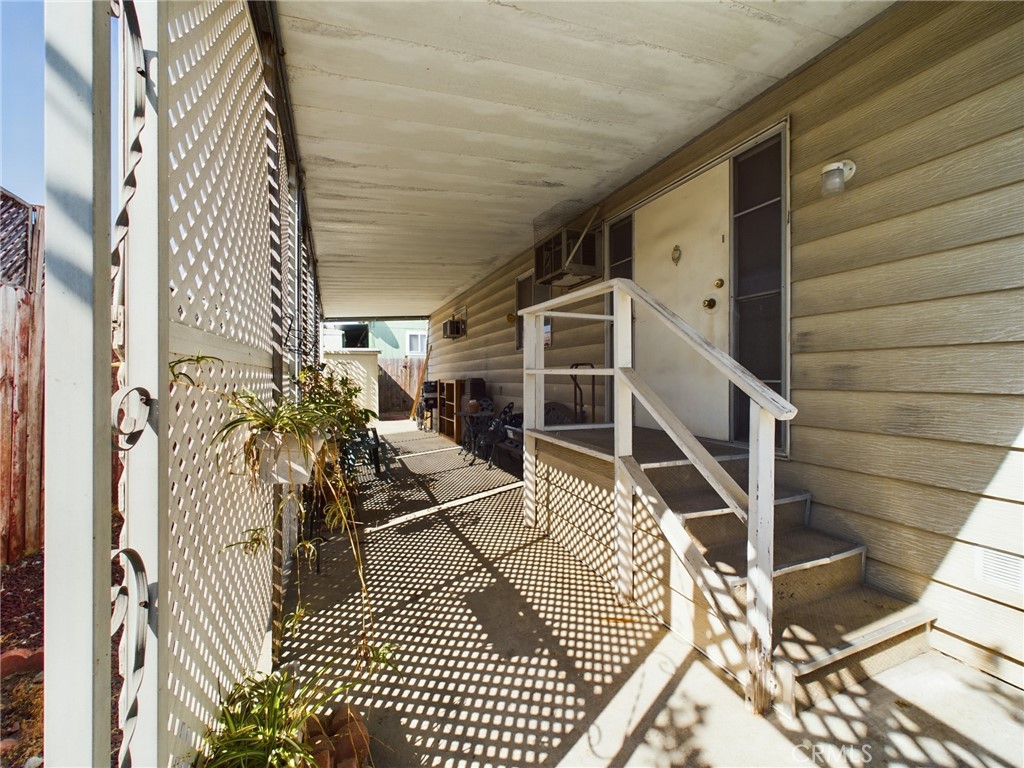 16600 Orange Avenue, Unit 55 Paramount, CA 90723 - Photo 4 of 18 a view of entryway with wooden floor