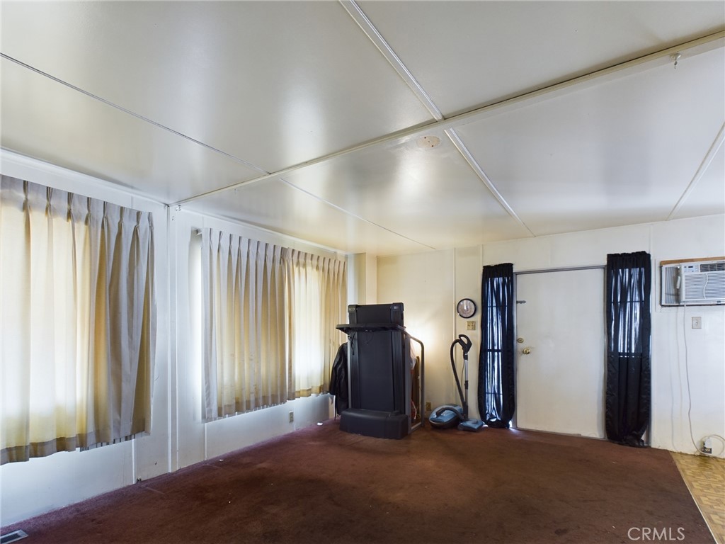 16600 Orange Avenue, Unit 55 Paramount, CA 90723 - Photo 6 of 18 a view of a room with gym equipment