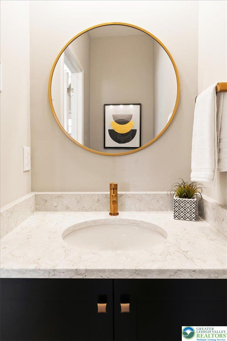 77 Tumble Creek Road, Unit 14 Easton, PA 18042 - Photo 17 of 33 Powder Room *Photos are of a previously built model home. Finishes, features, and options may vary*
