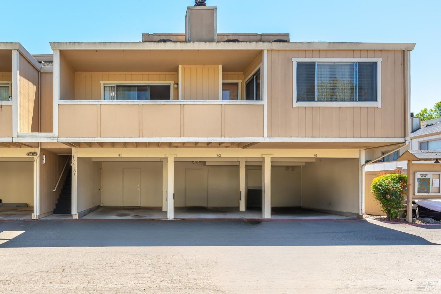 a front view of a house with a garage