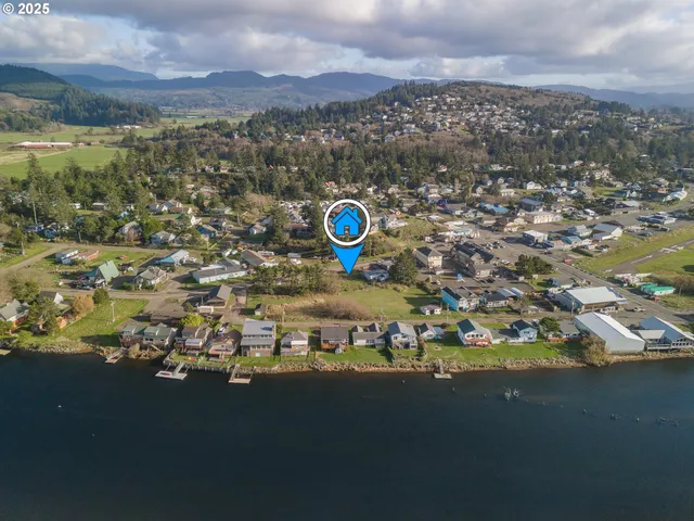 a view of an ocean with a mountain view