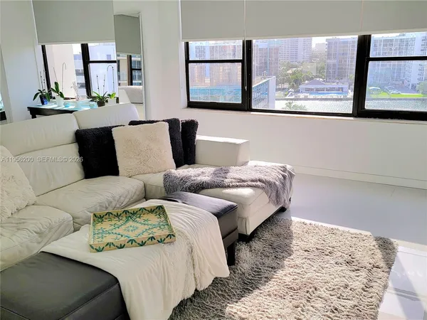 a bedroom with bed and window