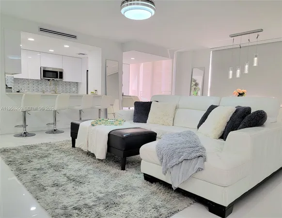 a bedroom with bed and a couch