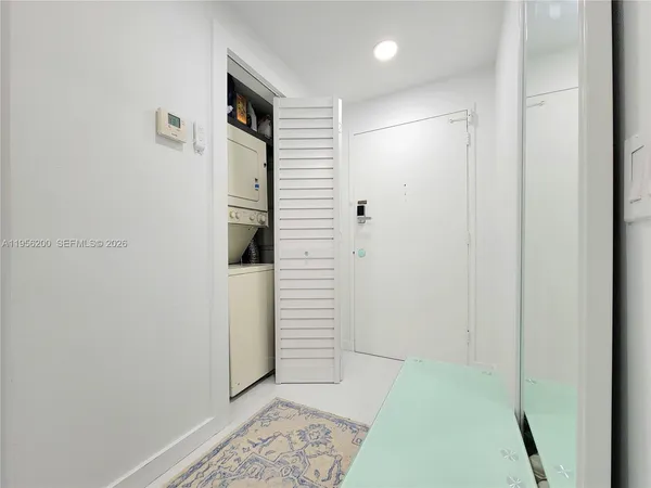 a view of a hallway with closet