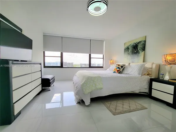 a bed room with a bed and a couch