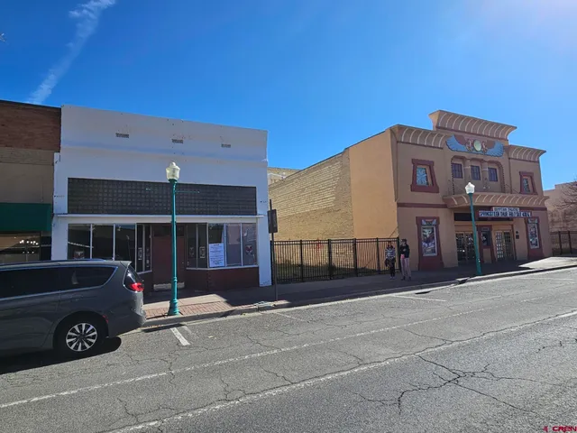 a car parked in front of a building