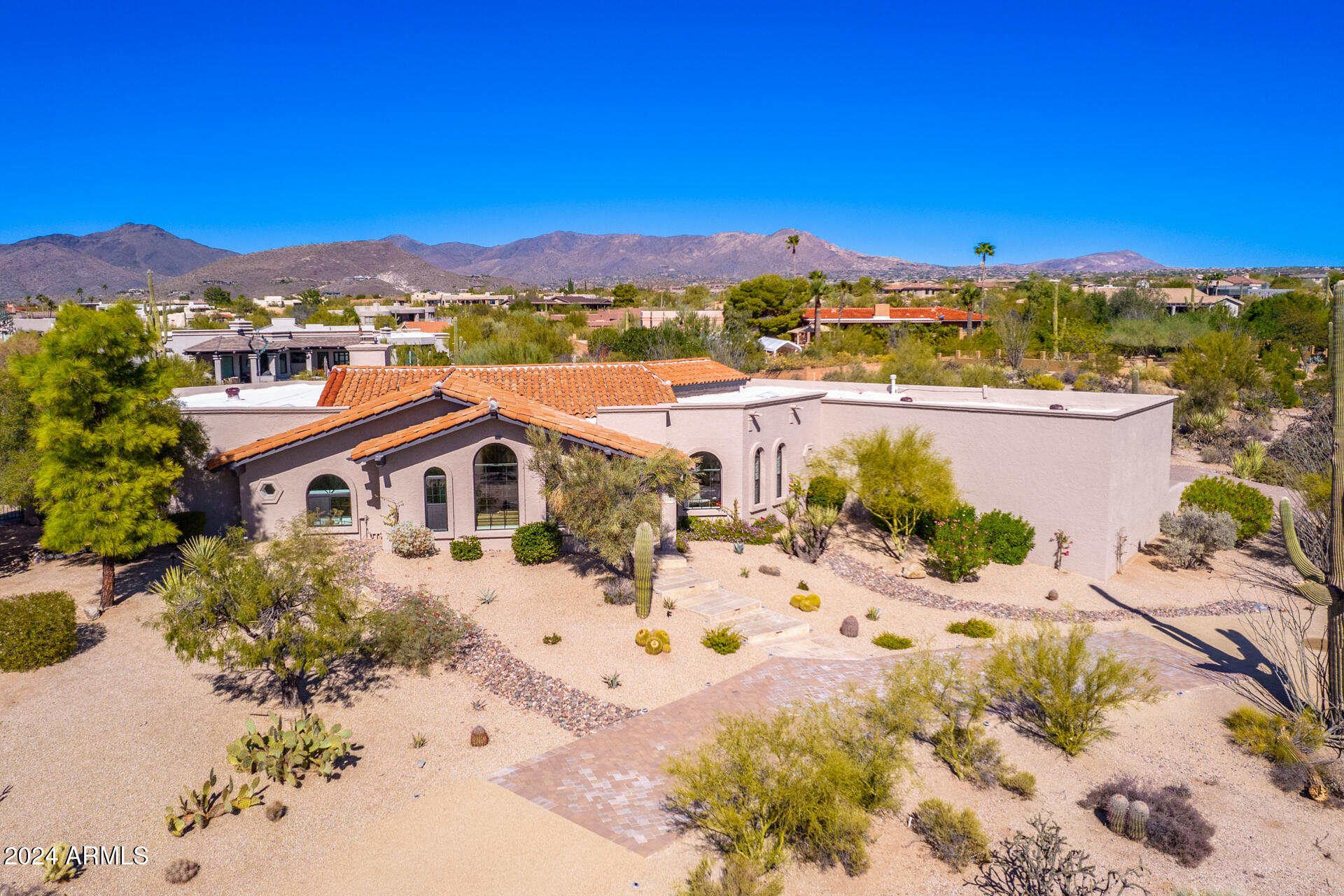 9446 Romping Road Carefree, AZ 85377 - Photo 111 of 119 a view of a house with a yard