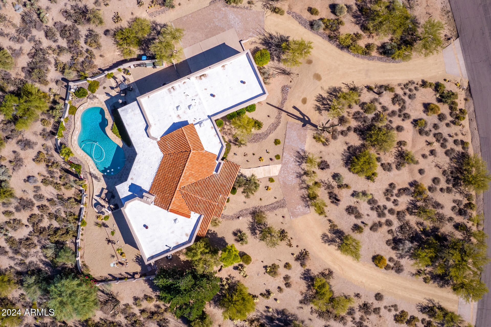 9446 Romping Road Carefree, AZ 85377 - Photo 118 of 119 an aerial view of a backyard