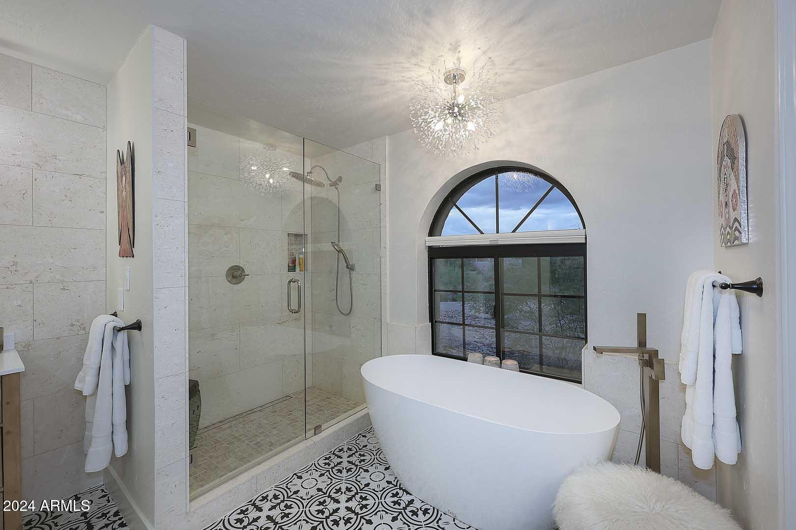 9446 Romping Road Carefree, AZ 85377 - Photo 50 of 119 Night-Primary Bath-Freestanding Tub