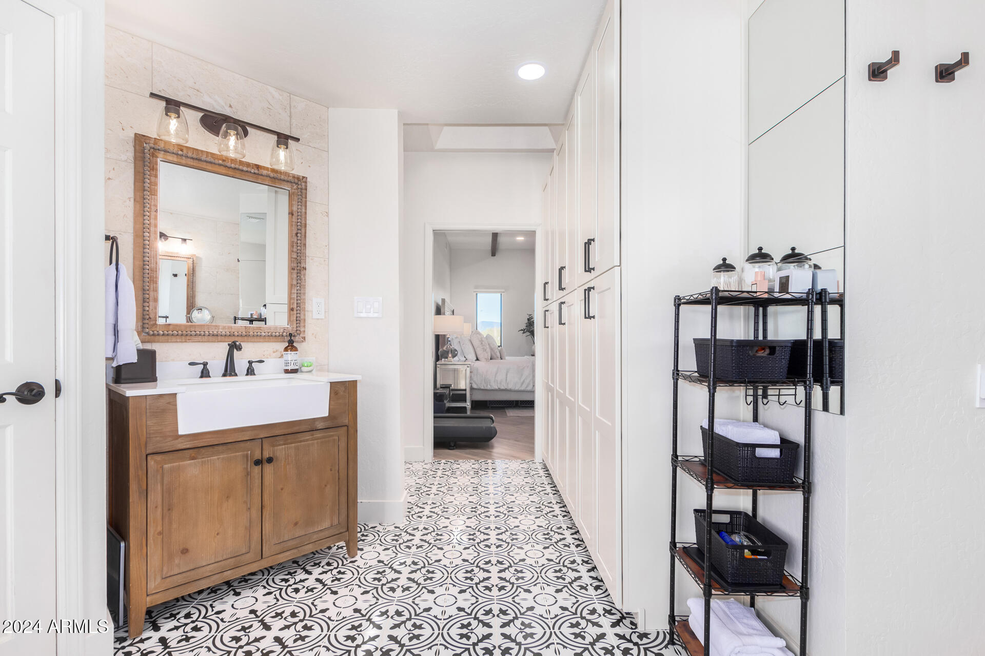 9446 Romping Road Carefree, AZ 85377 - Photo 52 of 119 a bathroom with a sink a toilet and shower