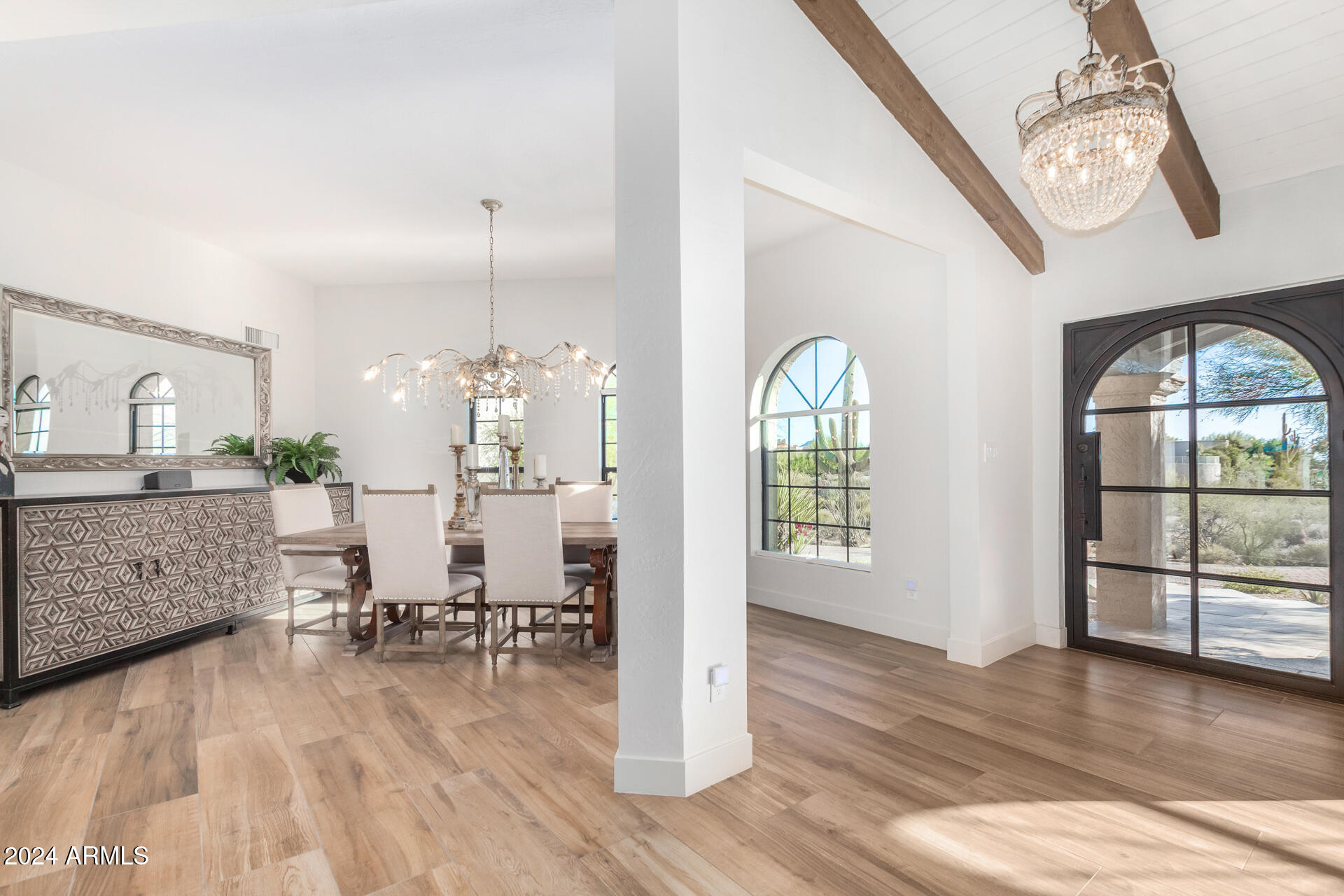 9446 Romping Road Carefree, AZ 85377 - Photo 9 of 119 a view of a livingroom with furniture wooden floor and a rug