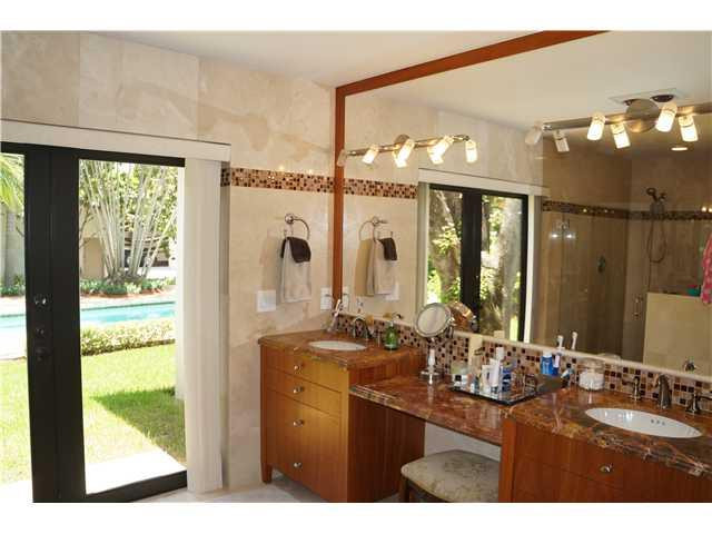 4920 Southwest 166th Avenue Southwest Ranches, FL 33331 - Photo 12 of 23 a bathroom with a sink vanity and a mirror