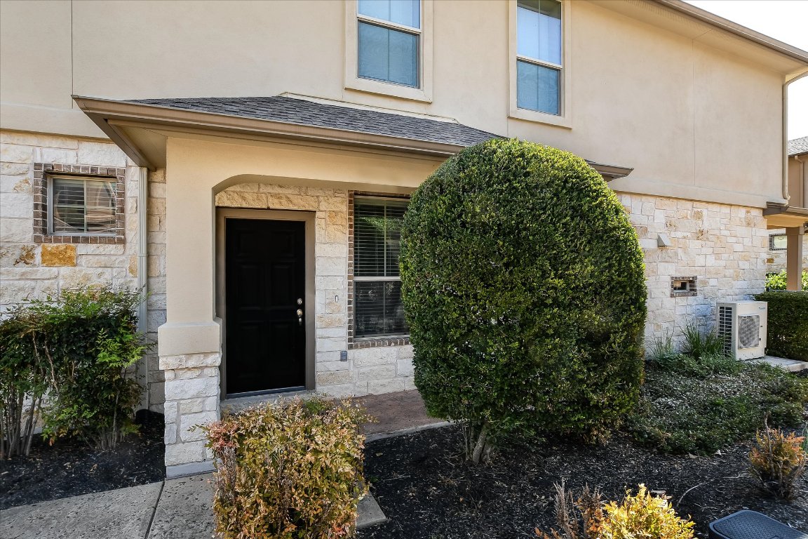 14001 Avery Ranch Boulevard, Unit 2104 Austin, TX 78717 - Photo 3 of 21 a view of a house with potted plants