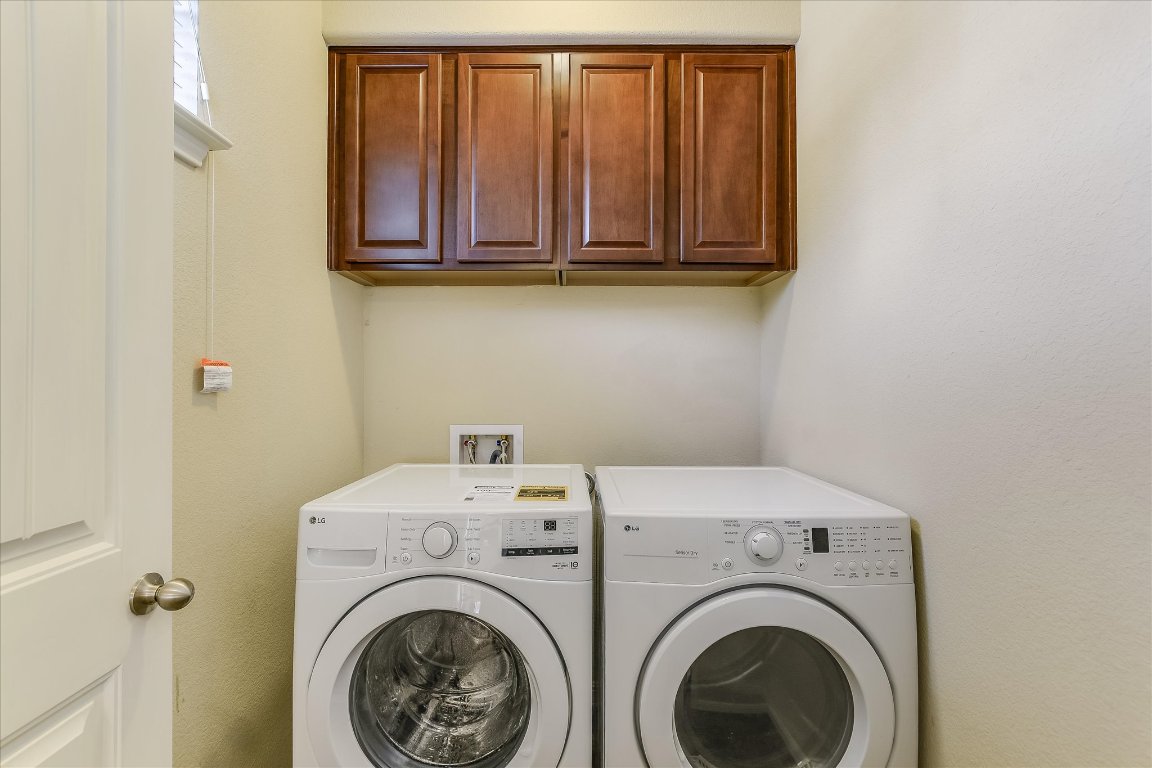 14001 Avery Ranch Boulevard, Unit 2104 Austin, TX 78717 - Photo 8 of 21 a utility room with dryer and washer