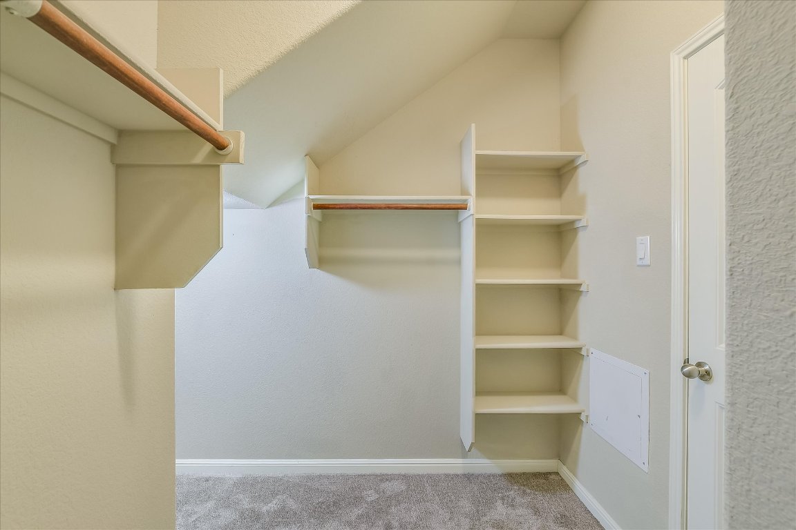 14001 Avery Ranch Boulevard, Unit 2104 Austin, TX 78717 - Photo 10 of 20 a view of walk in closet with empty racks