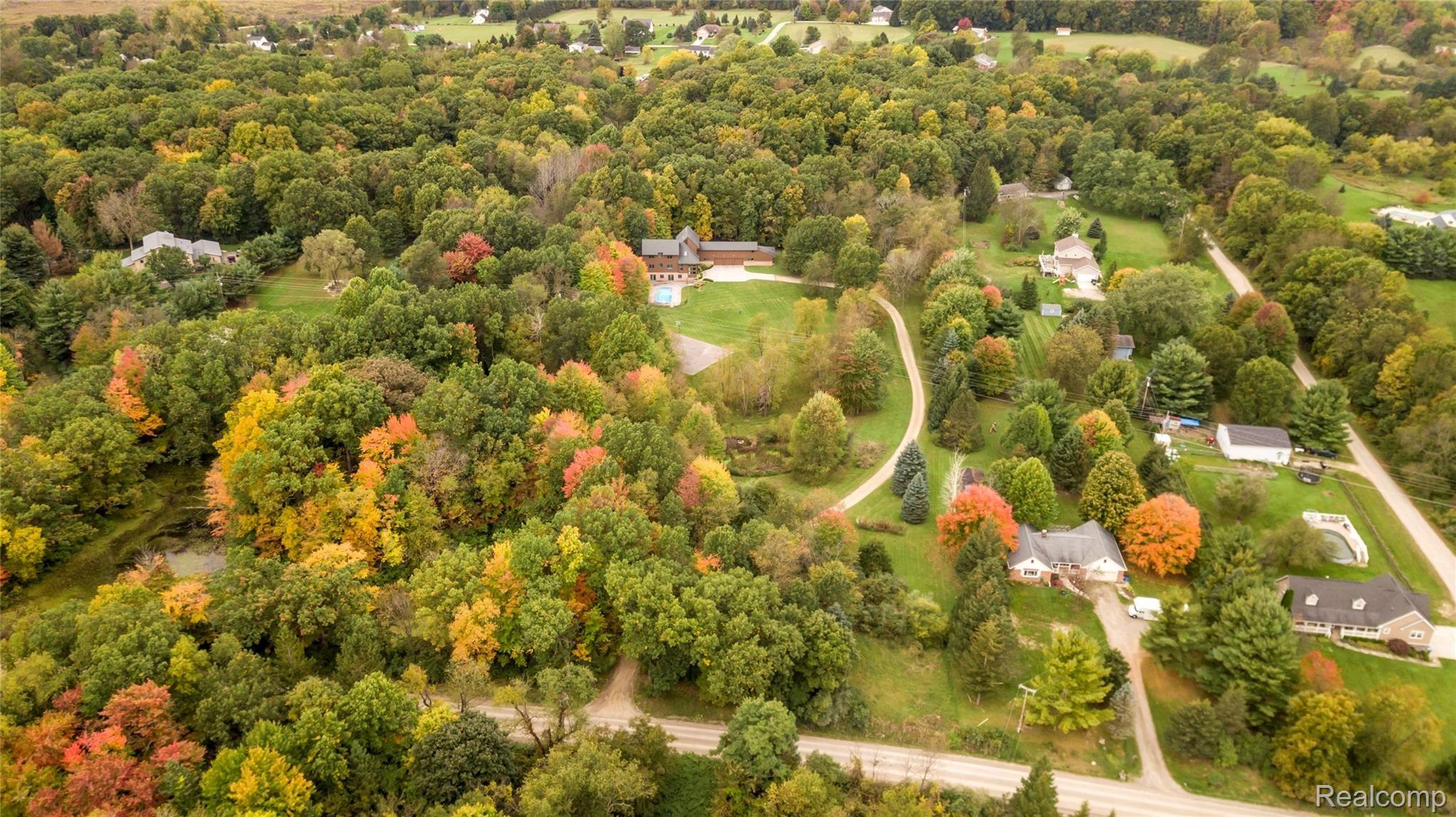 1287 North Kellogg Road Howell, MI 48843 - Photo 32 of 41 Tucked back off the road on a tree lined 10 acre estate