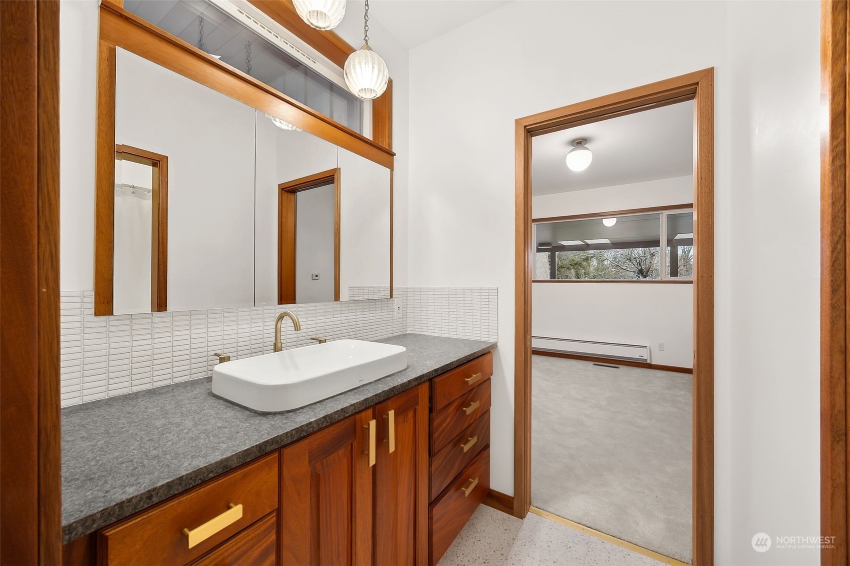 29011 7th Place South Federal Way, WA 98003 - Photo 22 of 40 a bathroom with a granite countertop sink and a mirror