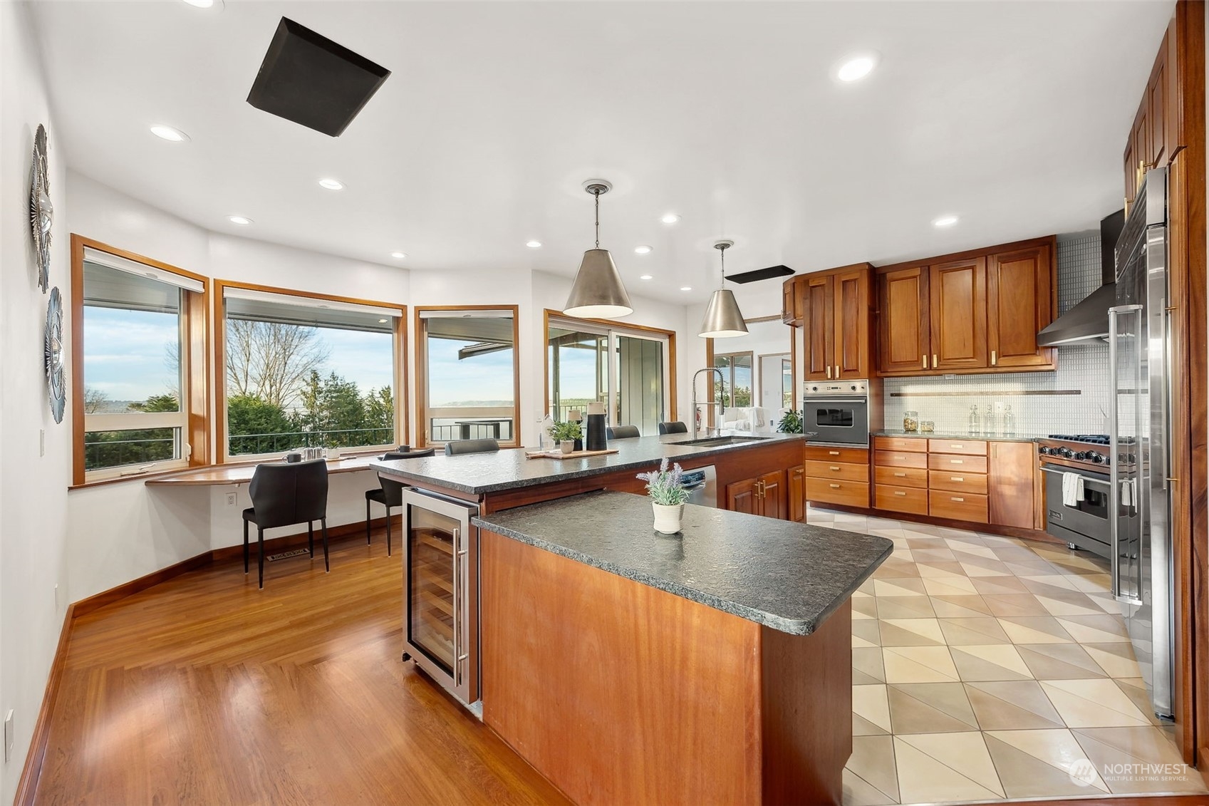 29011 7th Place South Federal Way, WA 98003 - Photo 8 of 40 a kitchen with stainless steel appliances granite countertop a sink counter space and a stove