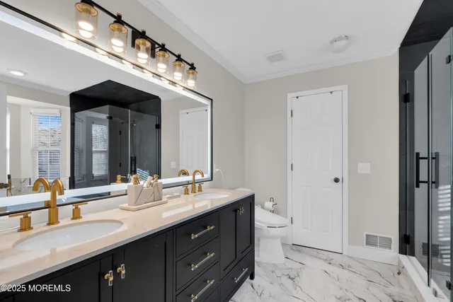 a spacious bathroom with a bathtub and large window