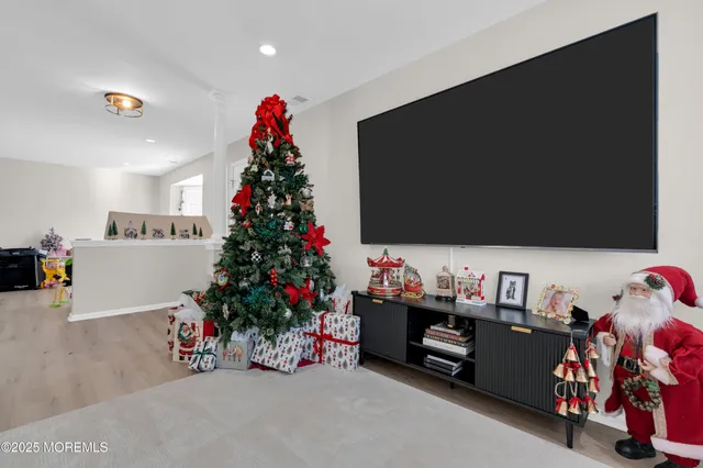 a room with toys and flat screen tv