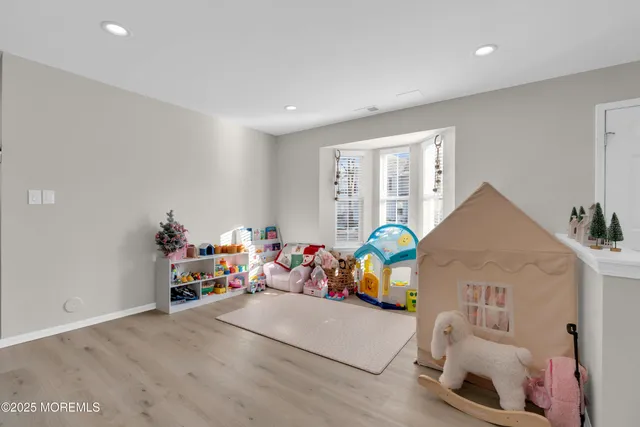 a view of a dining room with furniture and window