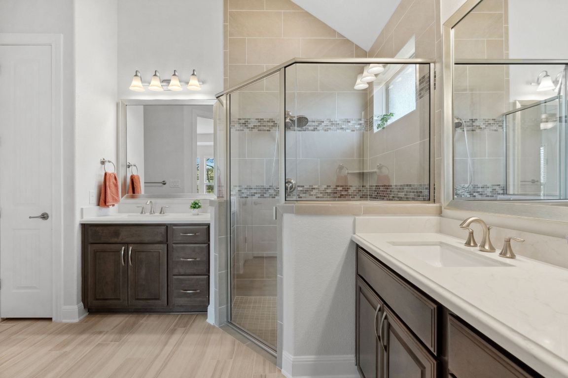 5152 Cornetto Bluffs Round Rock, TX 78665 - Photo 23 of 36 a bathroom with a sink and a mirror