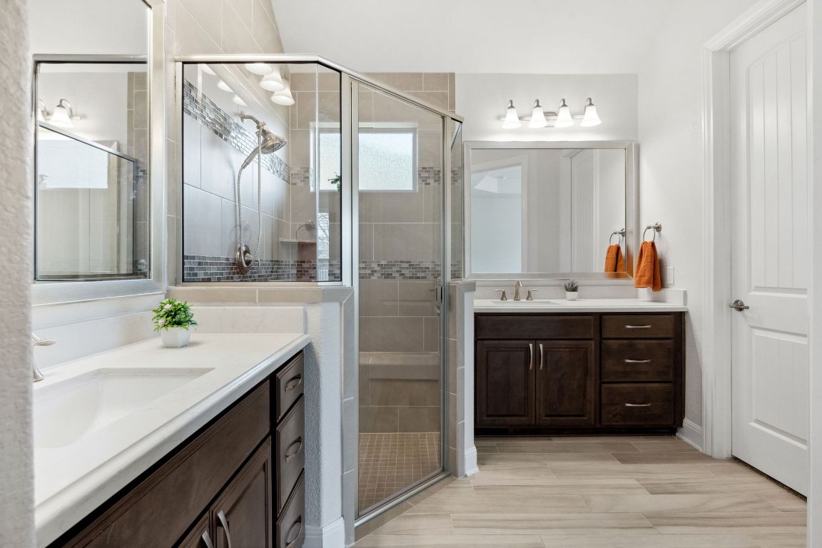 5152 Cornetto Bluffs Round Rock, TX 78665 - Photo 24 of 36 a bathroom with a sink double vanity and a mirror