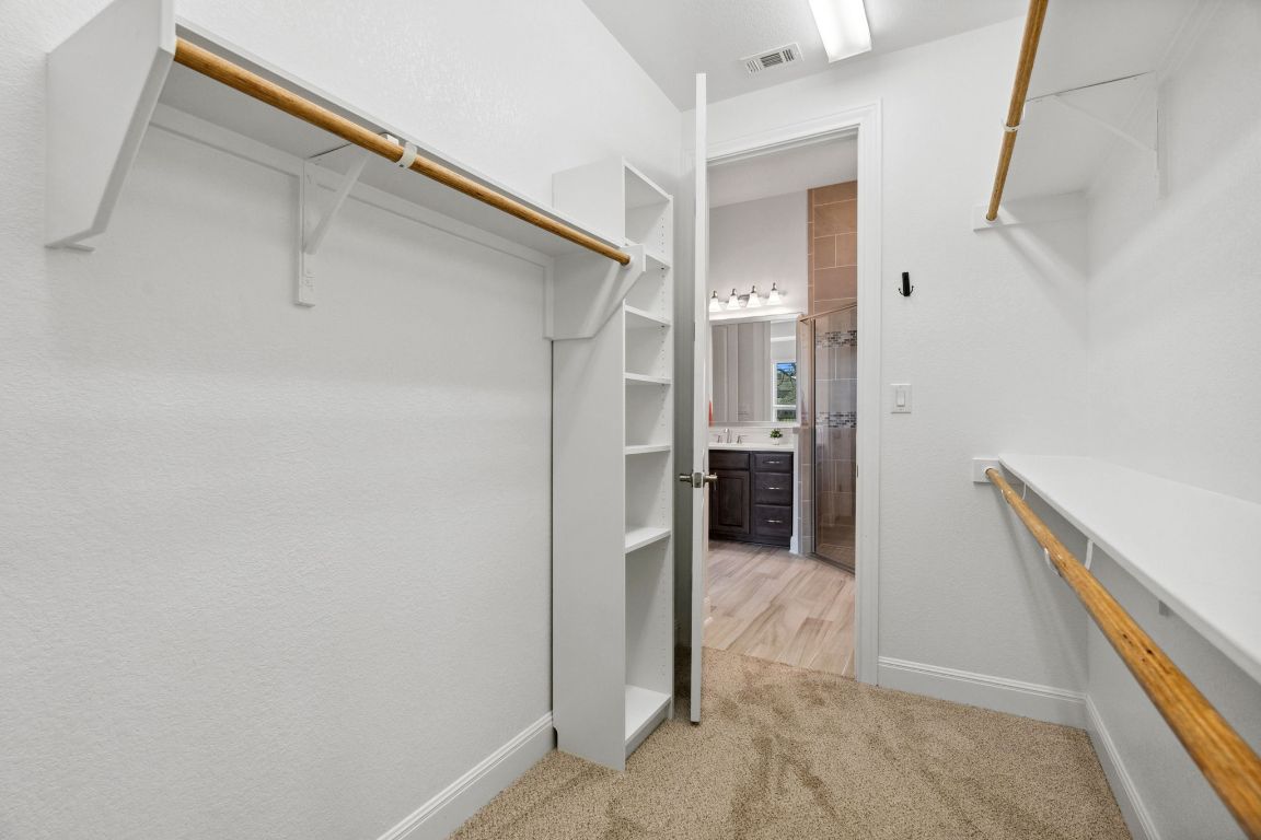 5152 Cornetto Bluffs Round Rock, TX 78665 - Photo 25 of 36 a bathroom with a shower and a sink