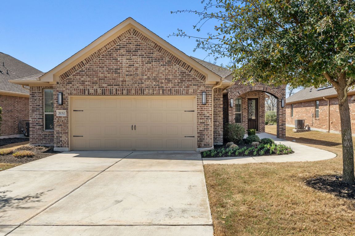 5152 Cornetto Bluffs Round Rock, TX 78665 - Photo 4 of 36 a view of a house with a yard potted plants