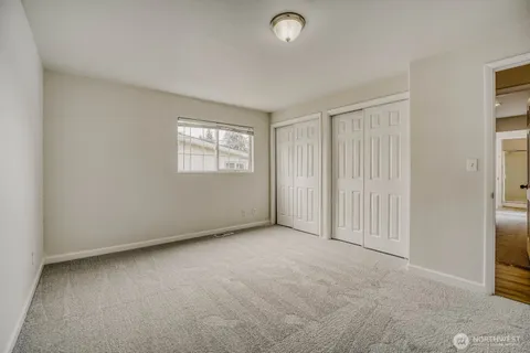 an empty room with fan