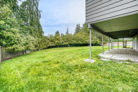 a house view with a garden space