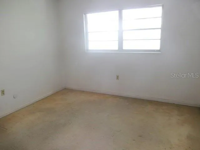 an empty room with a window