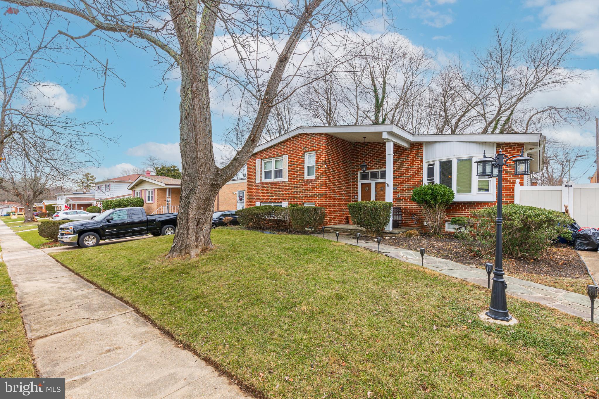 3819 Janbrook Road Randallstown, MD 21133 - Photo 1 of 47 a front view of a house with a yard