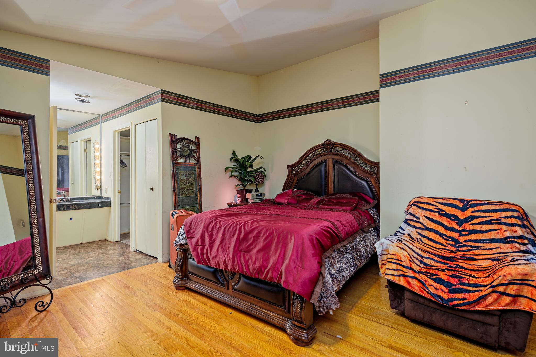 3819 Janbrook Road Randallstown, MD 21133 - Photo 15 of 47 a bedroom with a bed and dresser