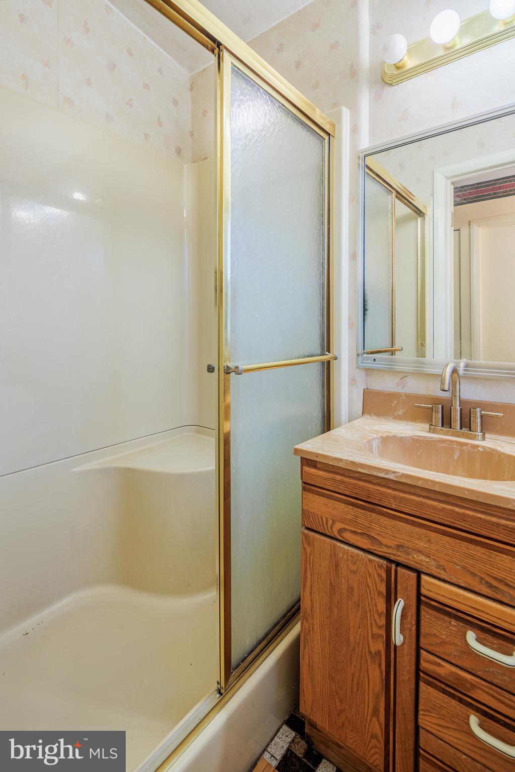 3819 Janbrook Road Randallstown, MD 21133 - Photo 20 of 47 a bathroom with a shower and a sink