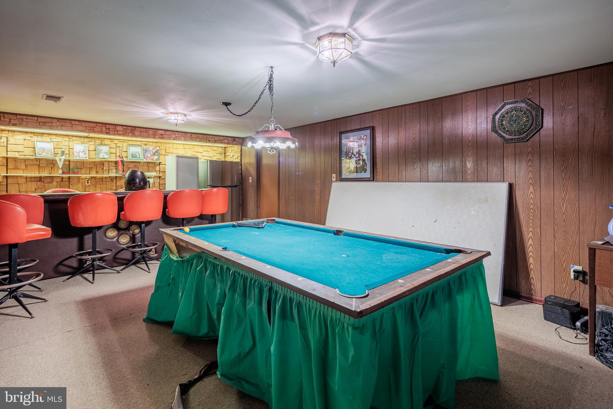 3819 Janbrook Road Randallstown, MD 21133 - Photo 31 of 47 a room with pool table and wooden floor