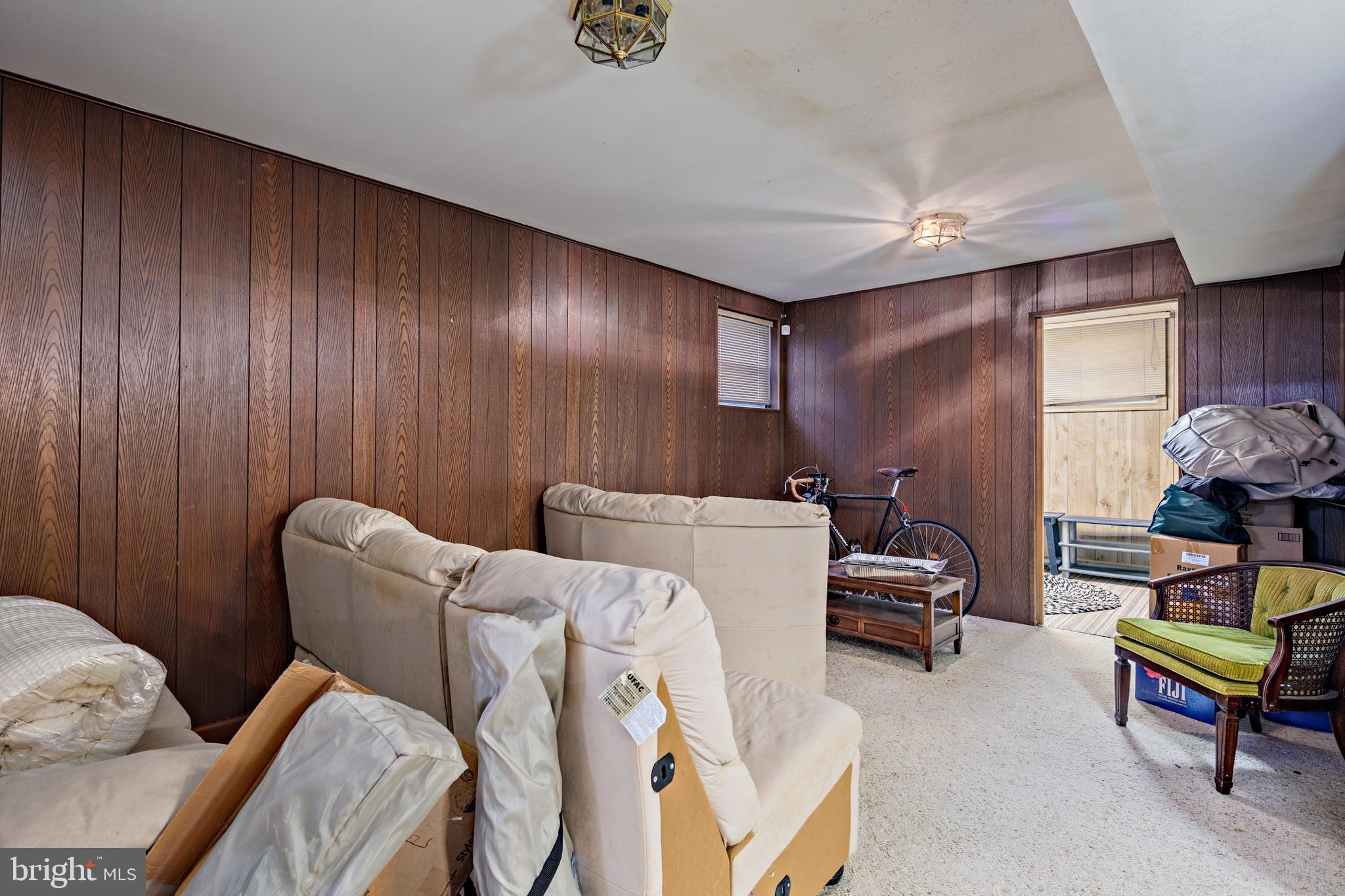 3819 Janbrook Road Randallstown, MD 21133 - Photo 33 of 47 a livingroom with workspace and a couch