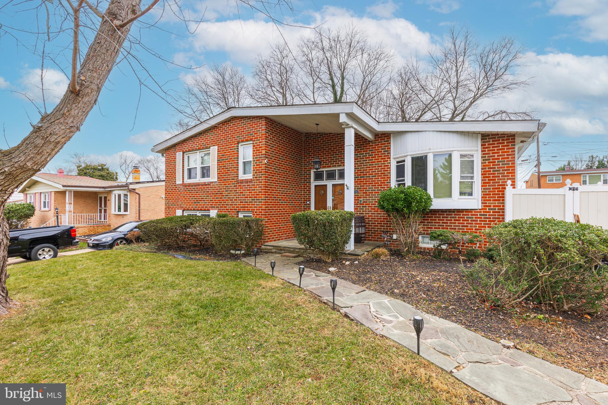 3819 Janbrook Road Randallstown, MD 21133 - Photo 45 of 47 a front view of a house with garden