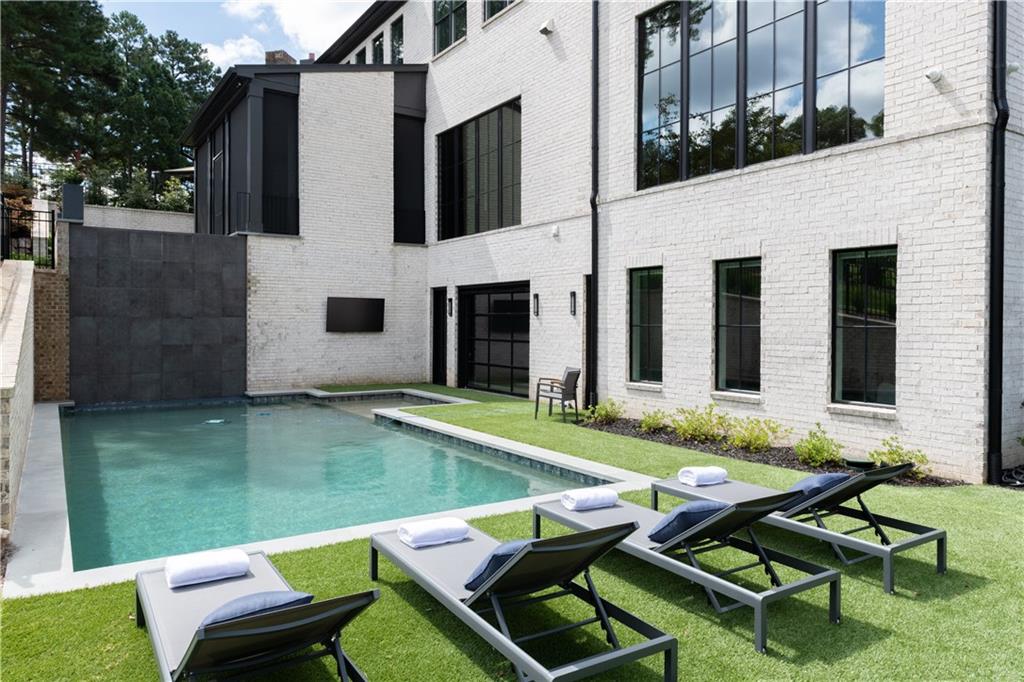 6142 Talmadge Run Acworth, GA 30101 - Photo 101 of 120 a view of backyard of house with outdoor seating