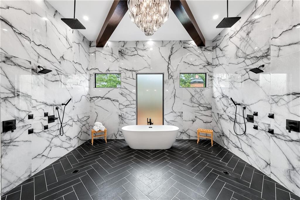 6142 Talmadge Run Acworth, GA 30101 - Photo 50 of 120 a bathroom with a sink a toilet and a shower curtain