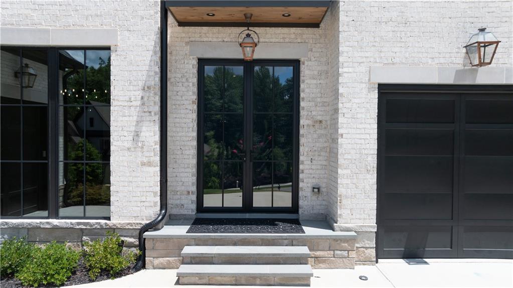 6142 Talmadge Run Acworth, GA 30101 - Photo 6 of 120 a front view of a house with a door and a window