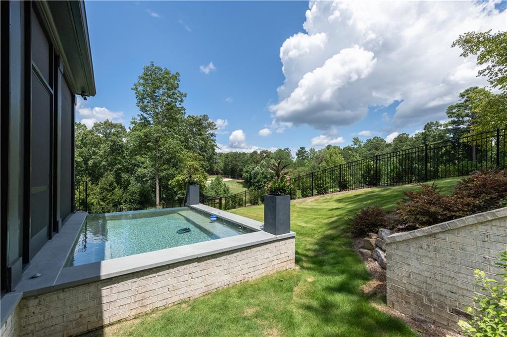 6142 Talmadge Run Acworth, GA 30101 - Photo 93 of 120 a view of a yard with an outdoor seating