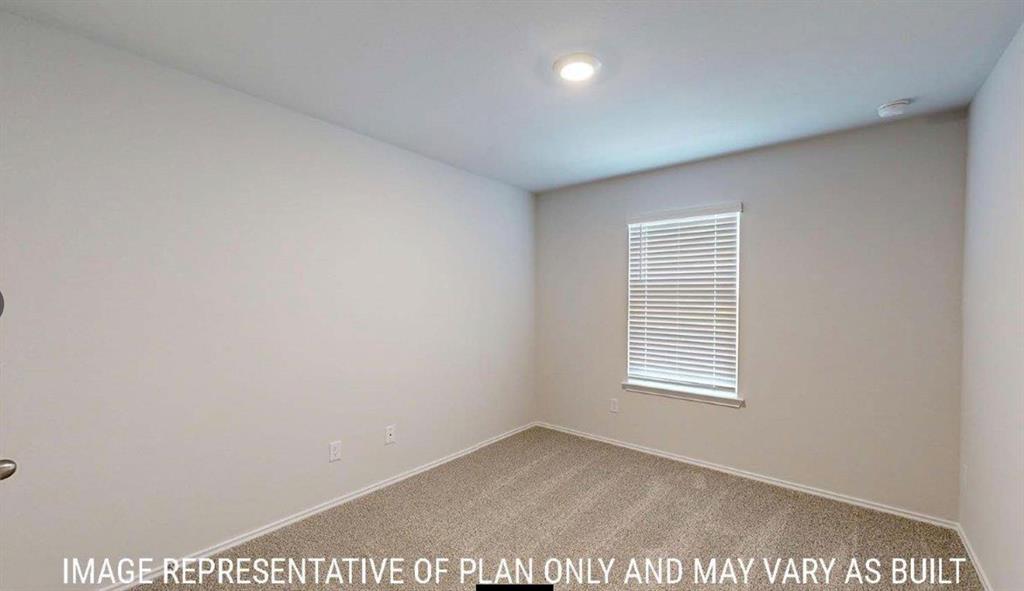 10313 Neptune Court Waco, TX 76708 - Photo 16 of 17 Interior room featuring light gray walls, textured carpeting, a single window with blinds, and a recessed ceiling light