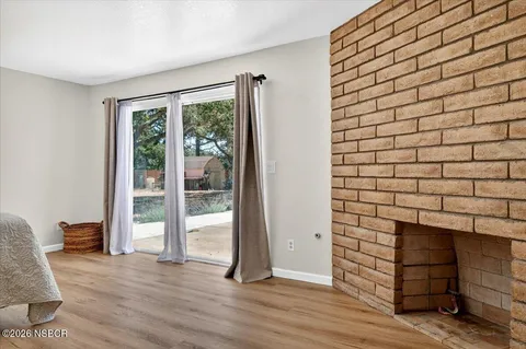 a view of livingroom with furniture and window
